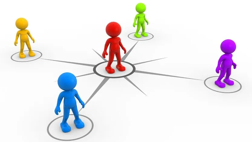 People in a circle with the leader in the middle