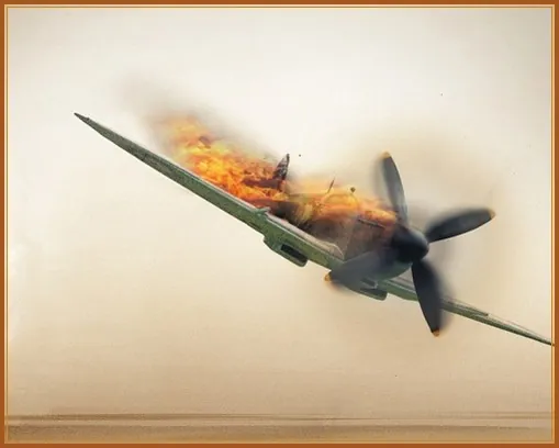 A propeller airplane going down in flames