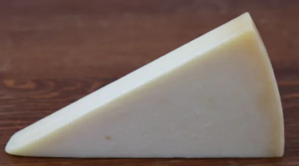A wedge of parmesan cheese.