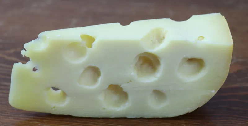 a wedge of Swiss cheese