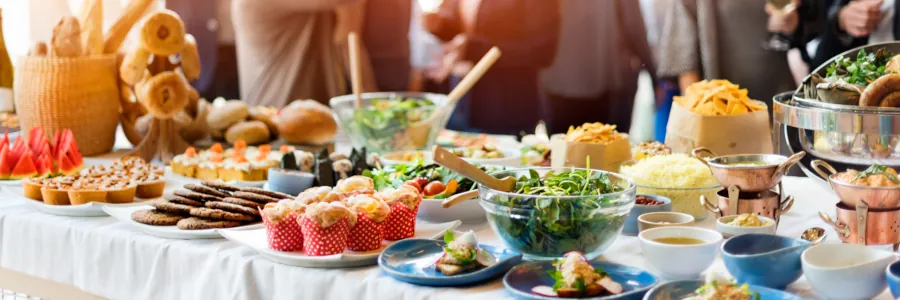 A catered lunch buffet with a variety of food