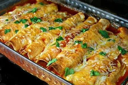 A casserole dish of homemade enchiladas.