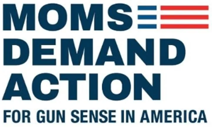 Protest sign saying "Moms demand action for gun sense in America