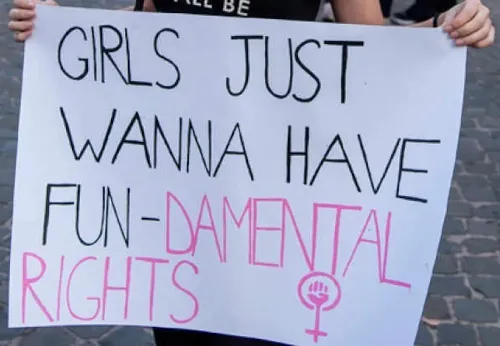 Sign from 2017 Women's March saying Girls Just Wanna Have Fun Damental Rights 