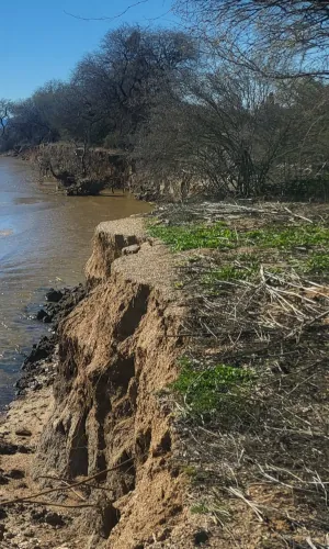 Unstable dirt along at the edge of a short cliff
